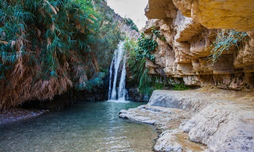 The picturesque waterfall and small lake.jpg