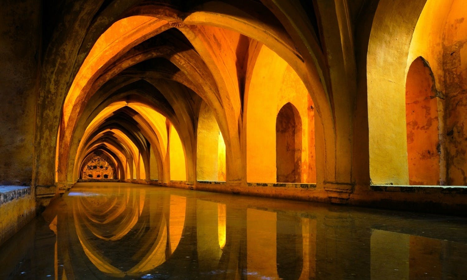 Royal baths at the Alcazar of Sevilla.jpg