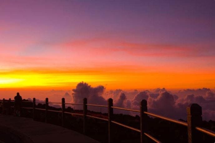 Haleakala sunrise red sky and fence maui.JPG