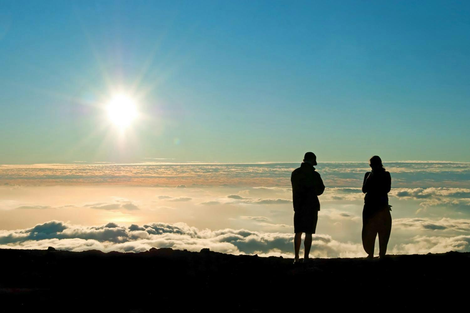 Haleakala sunset tour couple in the sun.jpg