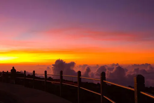 haleakala sunset tour colourful sky and fence.jpg
