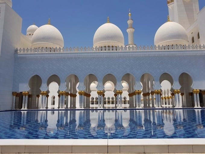 Abu Dhabi Sheikh Zayed Grand Mosque pool and pillars