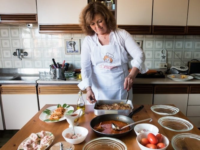 Market tour, cooking class and lunch or dinner at a Cesarina's home in Rome