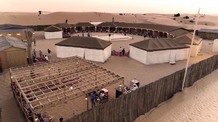 Red dunes desert safari with BBQ dinner and Tanoura dance show at Al Khayma Camp