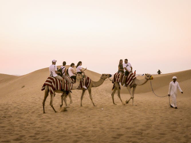 Abu Dhabi desert safari with BBQ, camel ride and sandboarding