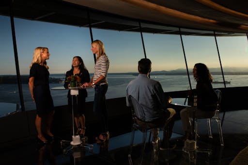 Enjoying the sunset at the Atmos Wine Bar. Courtesy of Space Needle and Rod Mar.jpg