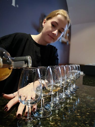 Drams being poured by Anna at Glenlivet.jpg