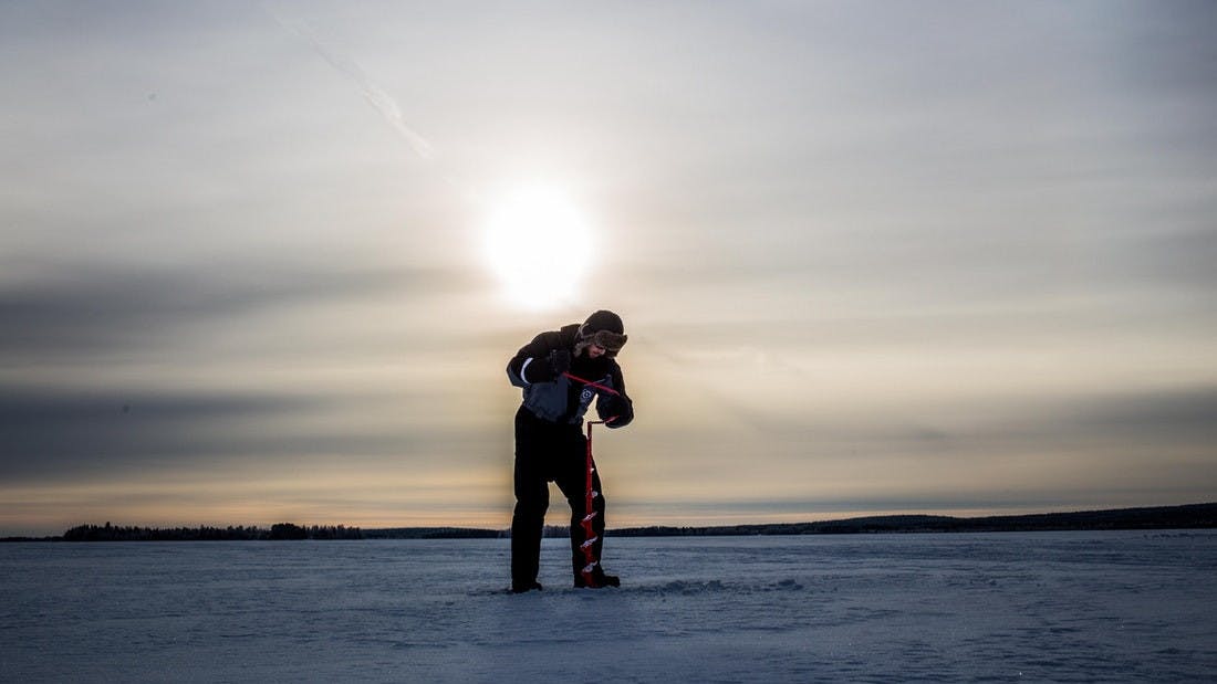Go ice fishing on a frozen lake 4.jpeg
