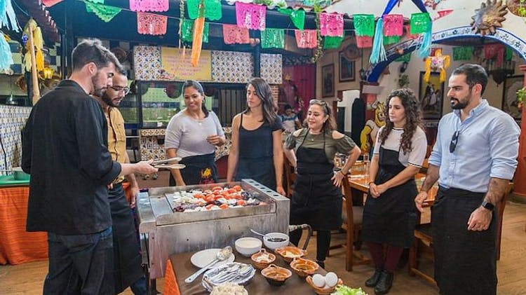 Mexican cooking class and local market guided tour with transportation in Cancun