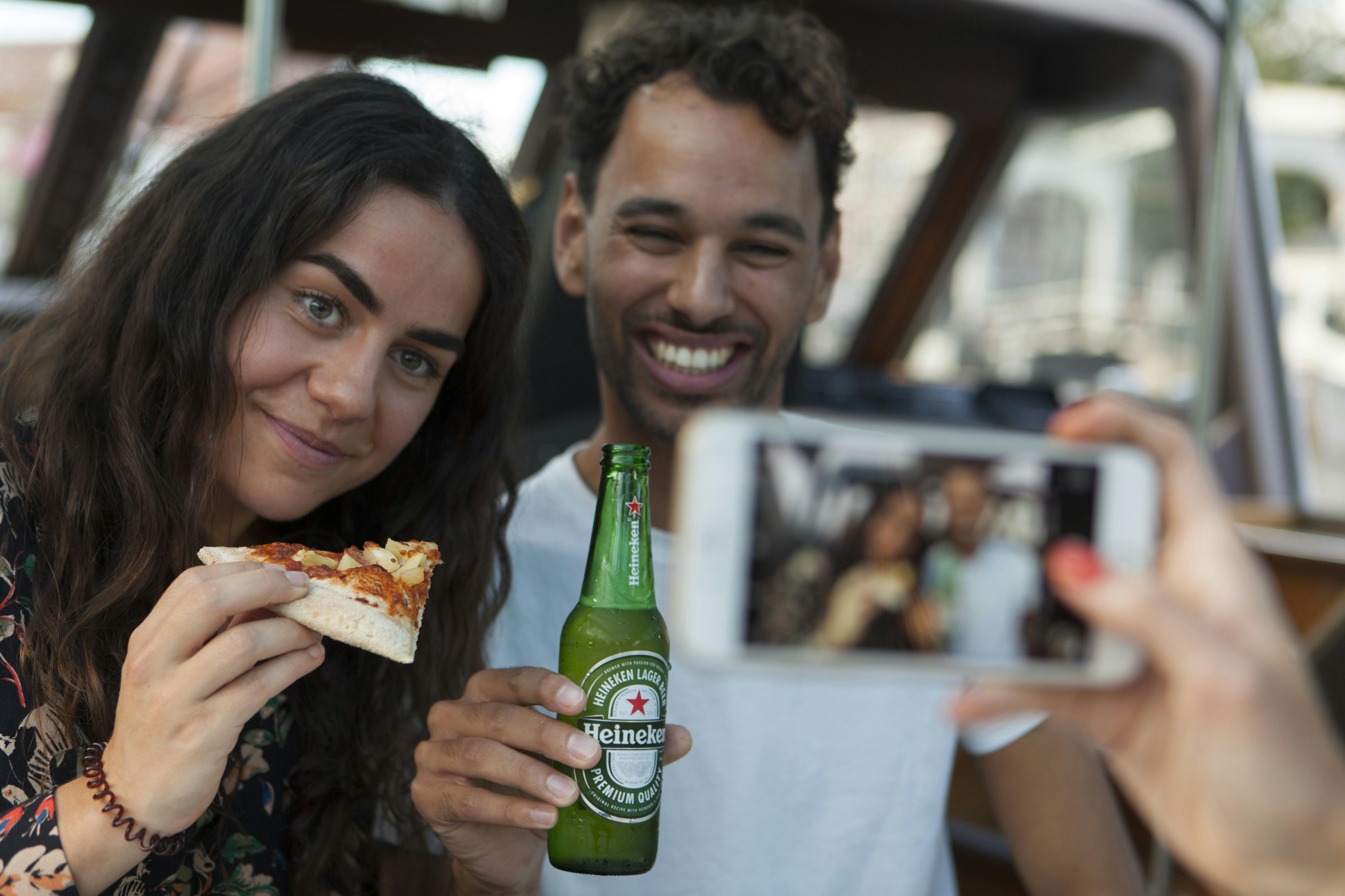 CTA Pizza Cruise_Selfie with pizza and beer.jpg