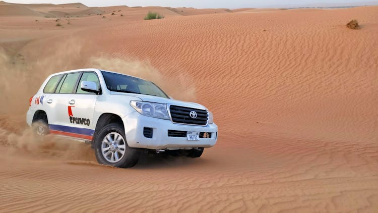 Dubai desert safari with BBQ dinner & local driver